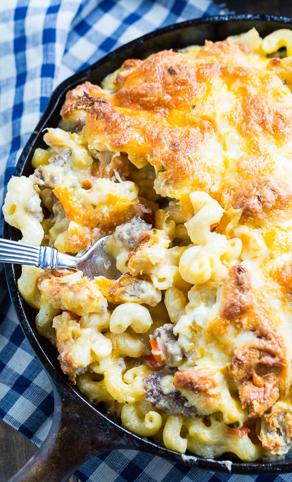 Breakfast Mac and Cheese with lots of sausage and crumbled biscuits on top.