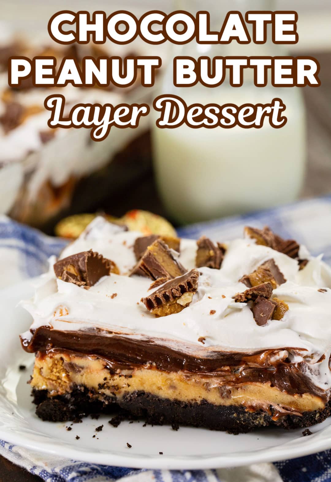 Piece of layer dessert on a plate.