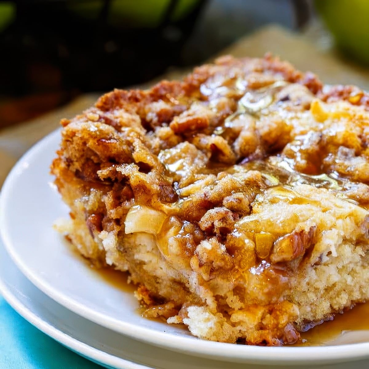 Slice of Apple Crisp Coffee Cake on a plate.