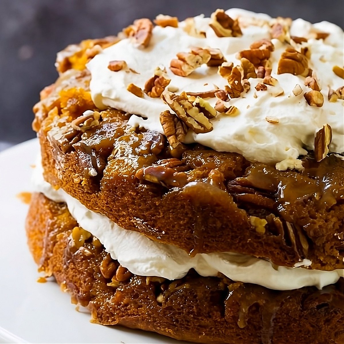 Pumpkin Praline Cake on a cake stand.