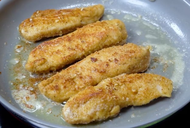 Cooking the chicken.