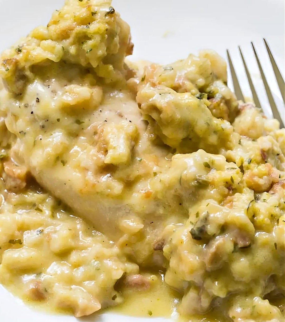 Instant Pot Swiss Chicken dished up on a plate.