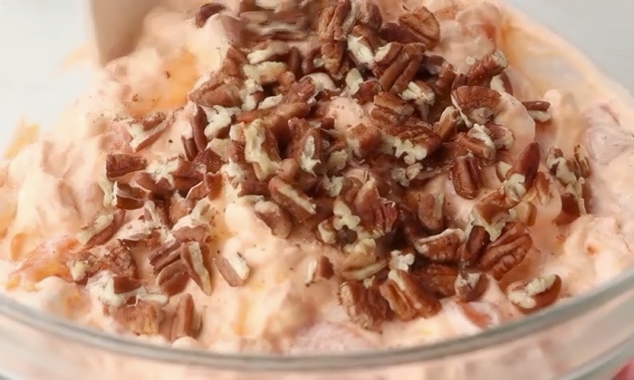 Adding the pecans.