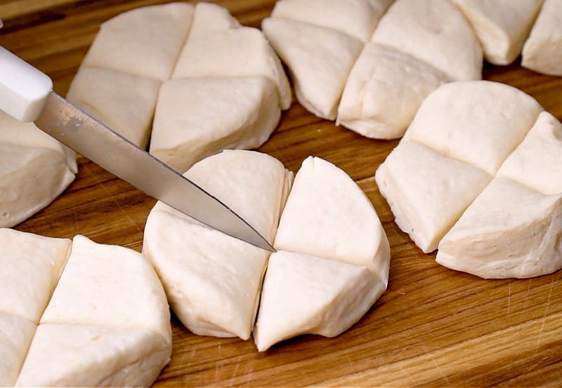 Cutting biscuits into fourths.