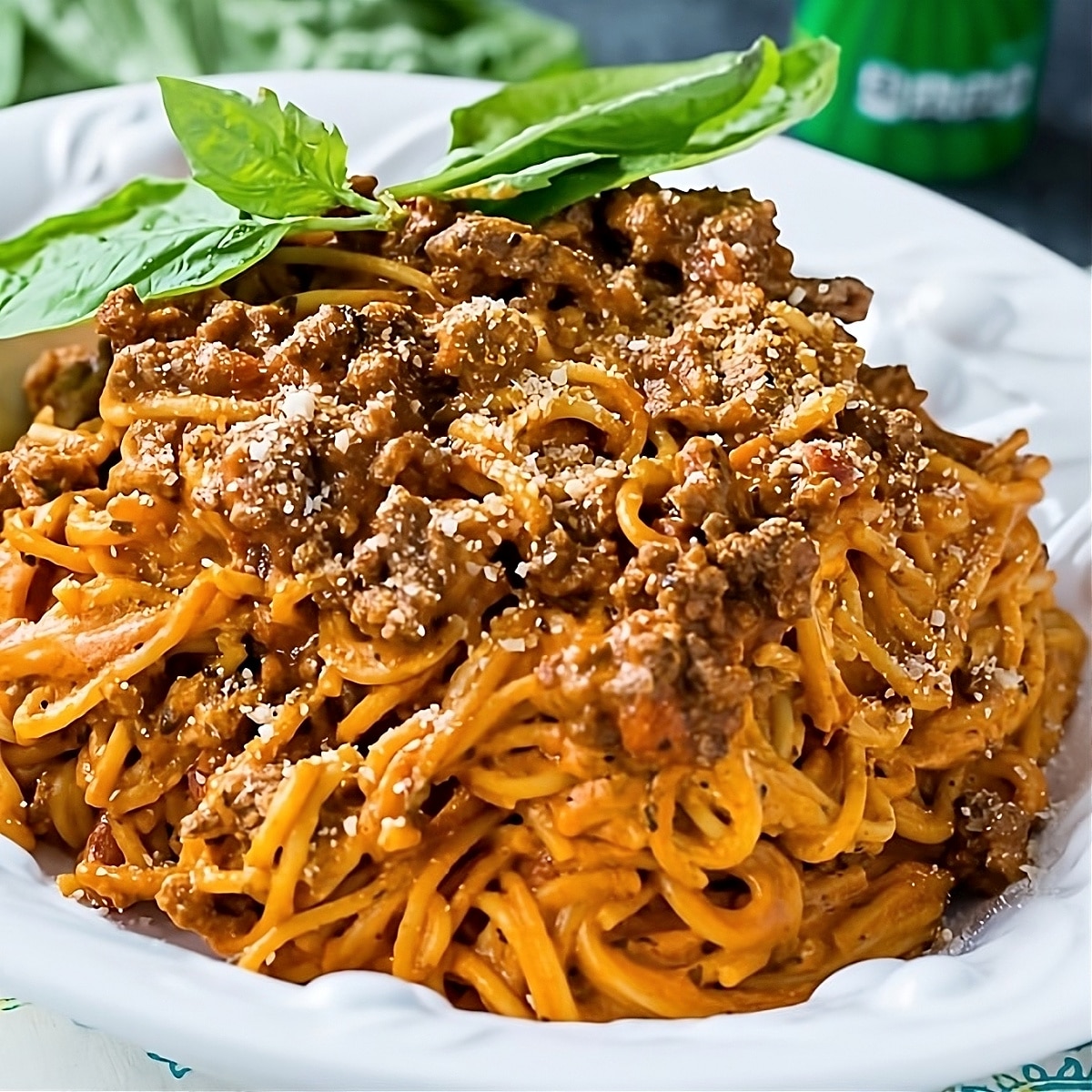 Instant Pot Cream Cheese Spaghetti topped with fresh basil.