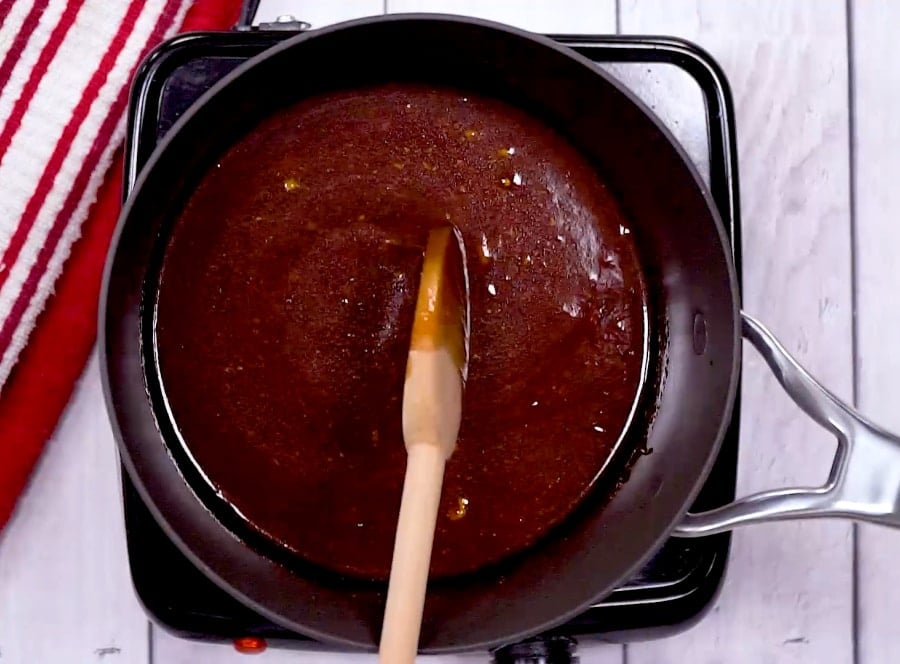 Simmering sauce in a saucepan.