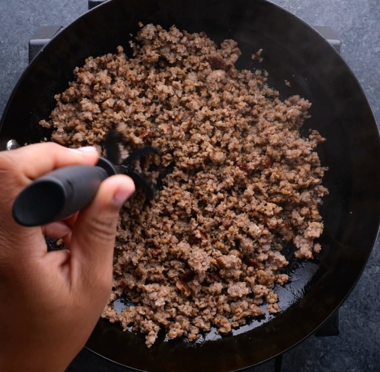Cooked and crumbled sausage.