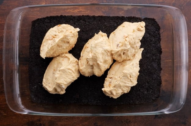 Spreading the peanut butter layer.