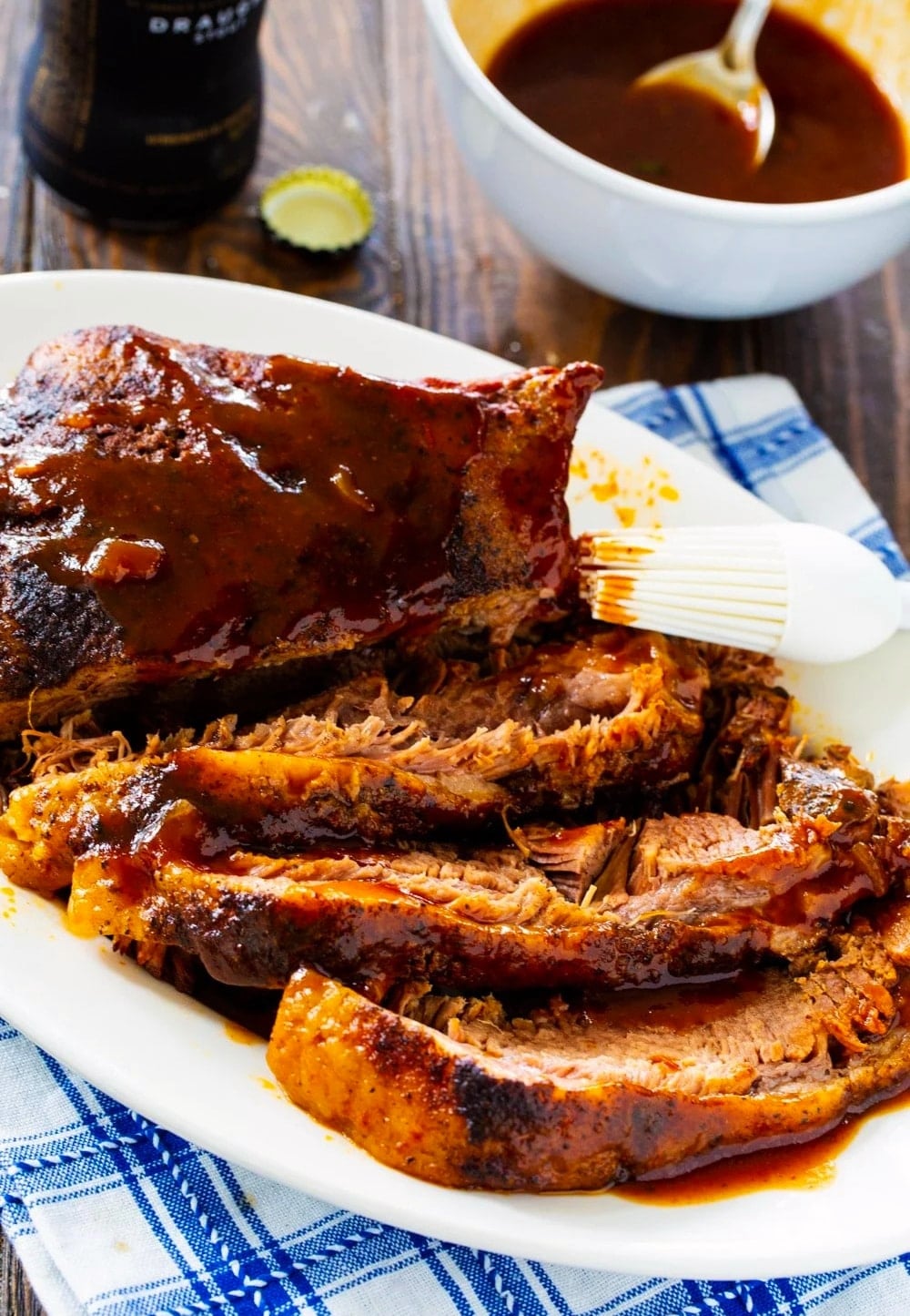 Sliced Slow Cooker Brisket on a serving platter.