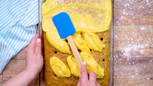 Spreading pudding mixture.