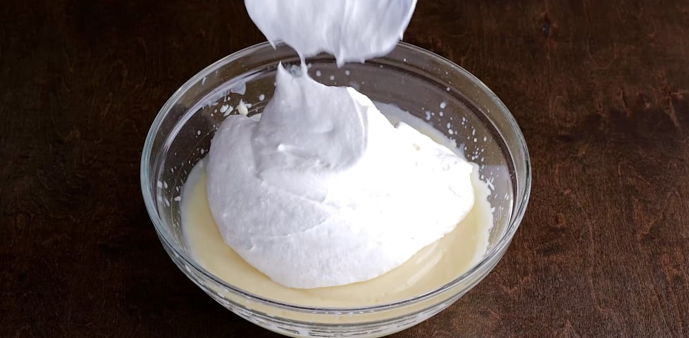 Adding the Cool Whip to filling.