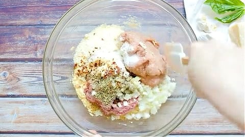Meatloaf mixture in bowl.