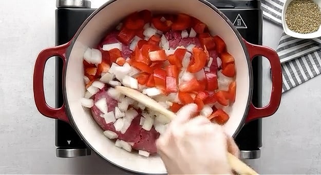 Cooking ground beef and onions.