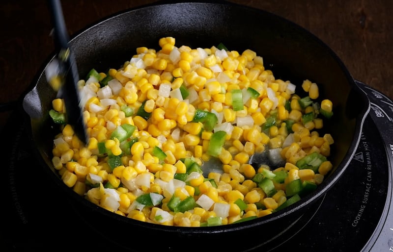 Sauteing corn mixture.