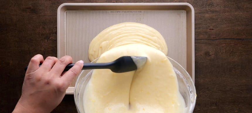 Pouring the batter into sheet pan.