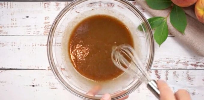 Butter mixture being mixed together.