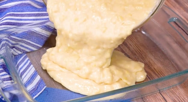 Pouring batter into pan.