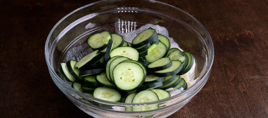 Adding the cucumbers.