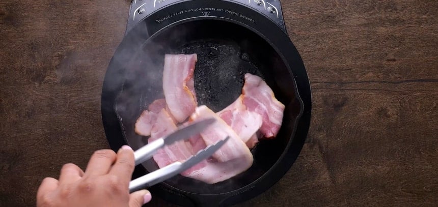 Cooking the bacon.