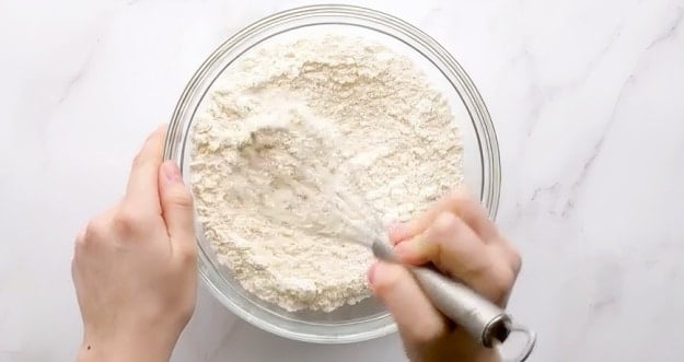 Combining dry ingredients.