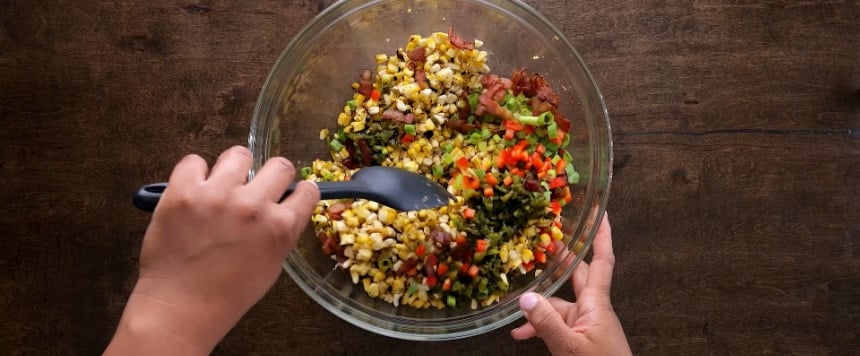 Mixing the ingredients together.