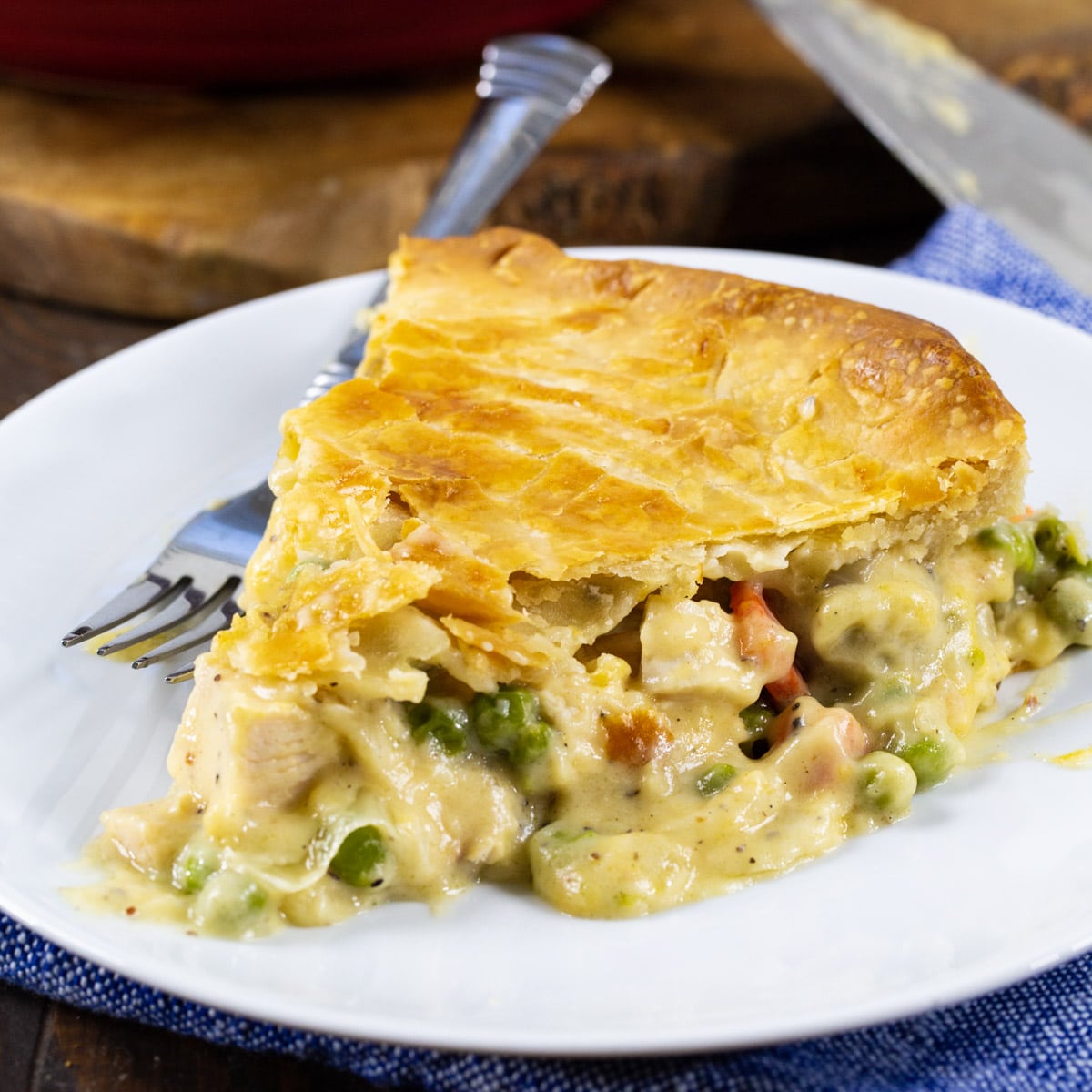 Slice of pot pie on a plate.