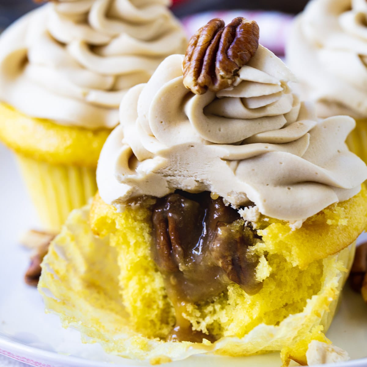Pecan Pie Cupcake with a bite take out to show inside.