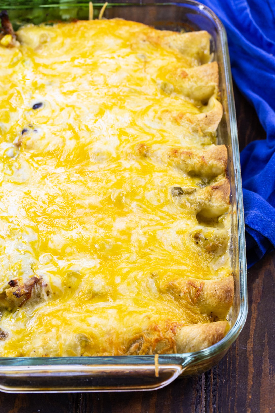 Cooked Enchiladas in a 9x13-inch baking dish.