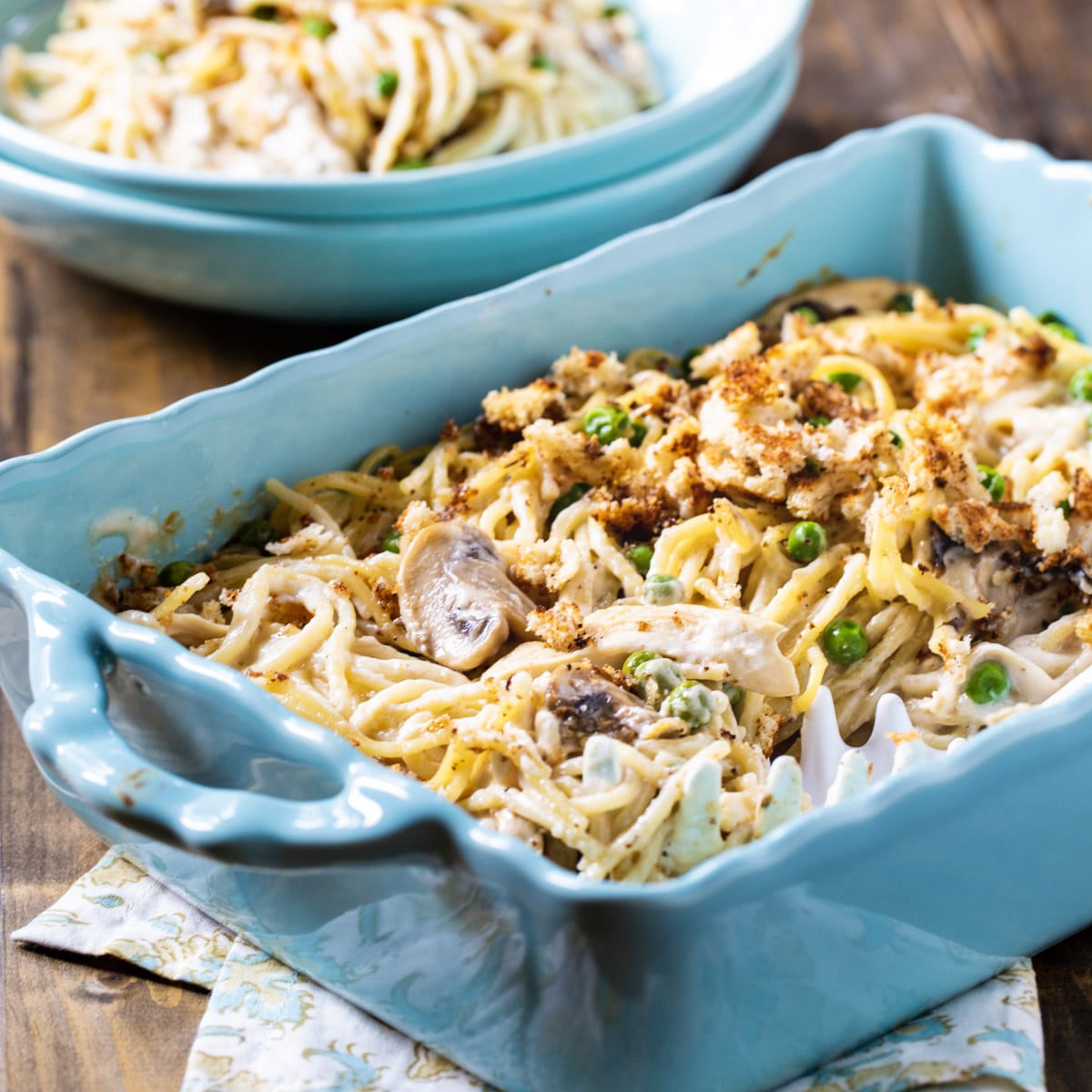 Turkey Tetrazzini in a blue casserole dish.