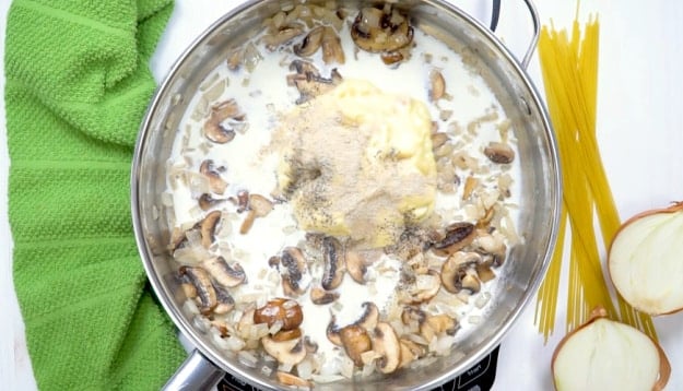 Adding soup and milk.