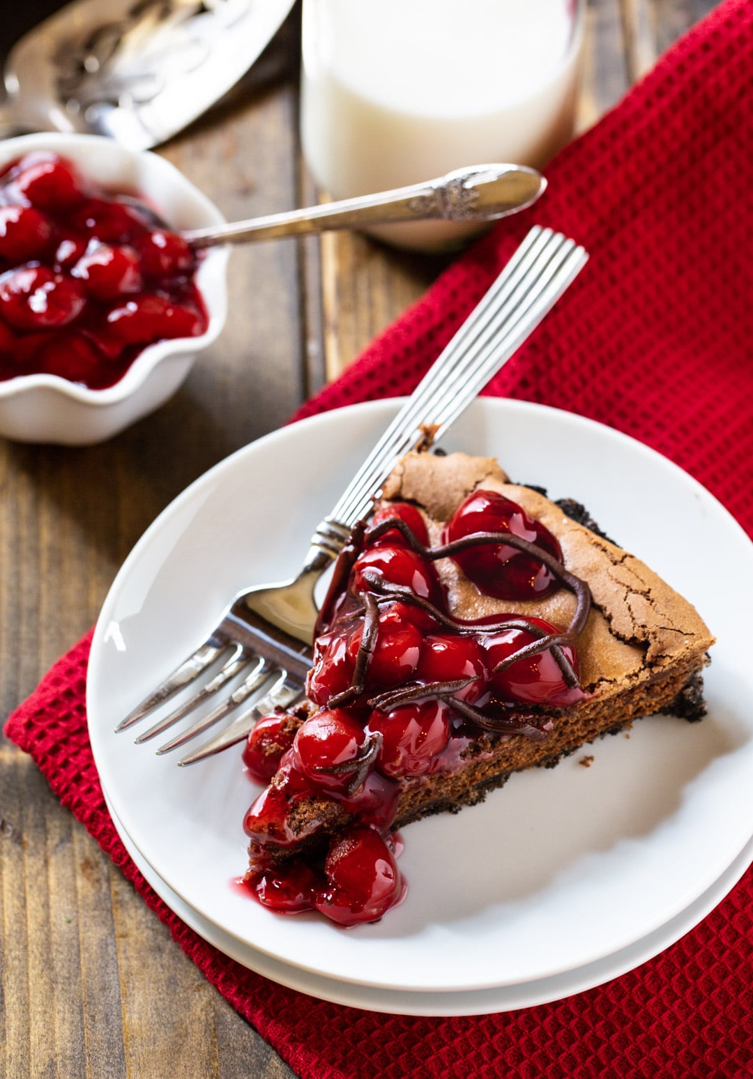 Black Forest Tart slice on a plate.