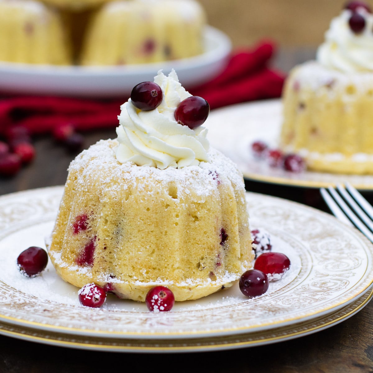 Mini Almond Cranberry Cake on a gold-plated plate.