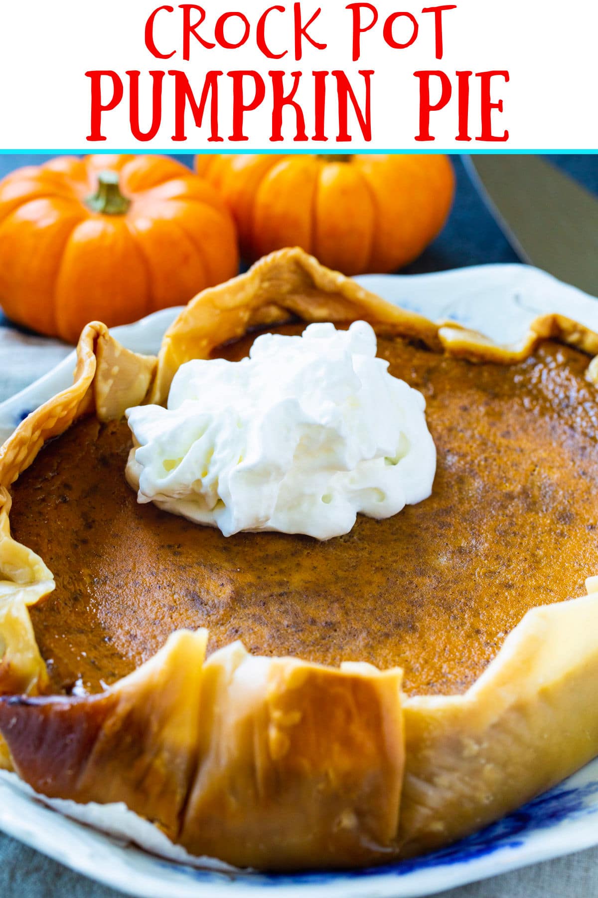Crock Pot Pumpkin Pie topped with whipped cream.
