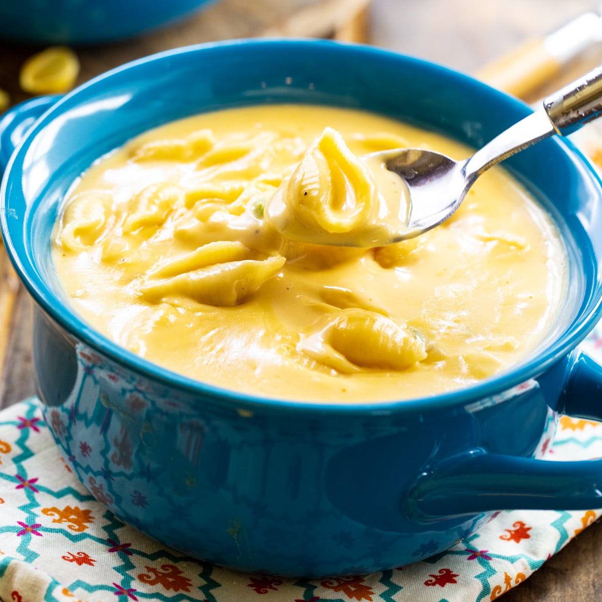 Mac and Cheese Soup in a blue bowl.