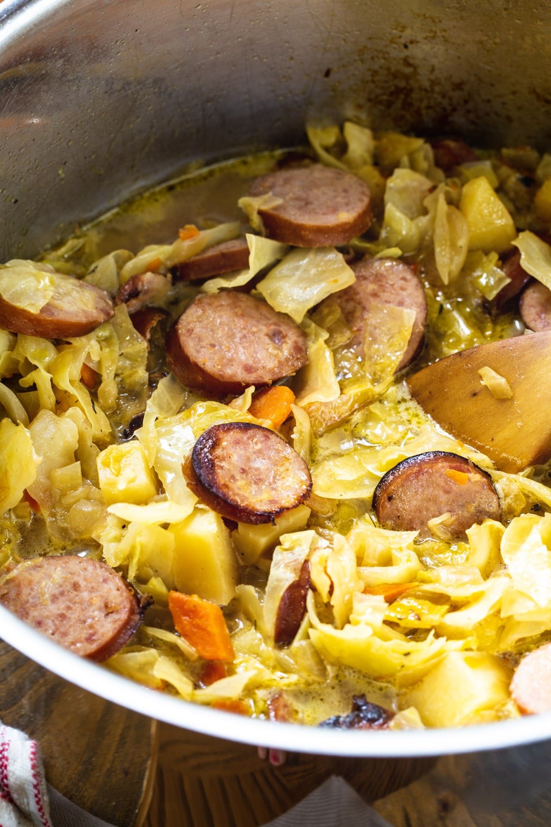 Close-up of cabbage soup in pot.