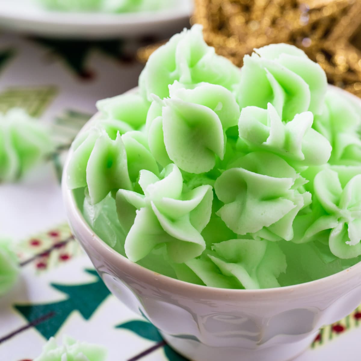 Green Cream Cheese Mints in a bowl.