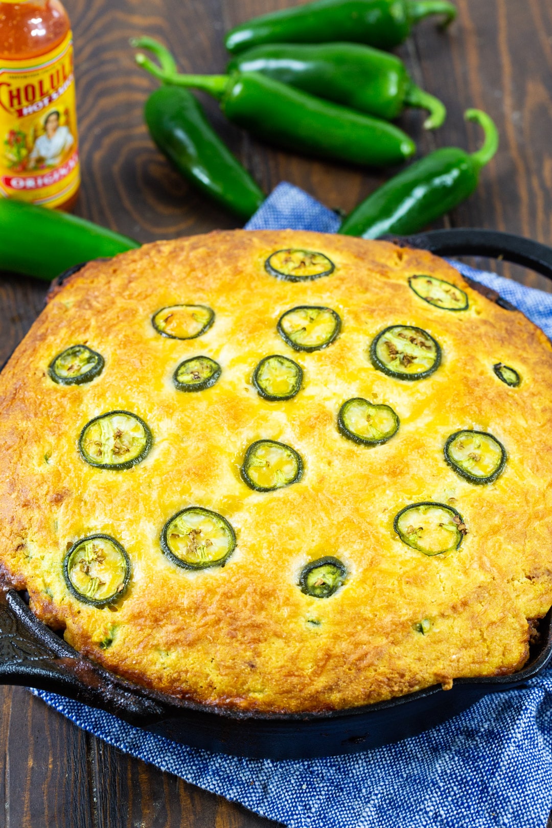 Jalapeno Chili Cornbread Casserole in cast iron pan.