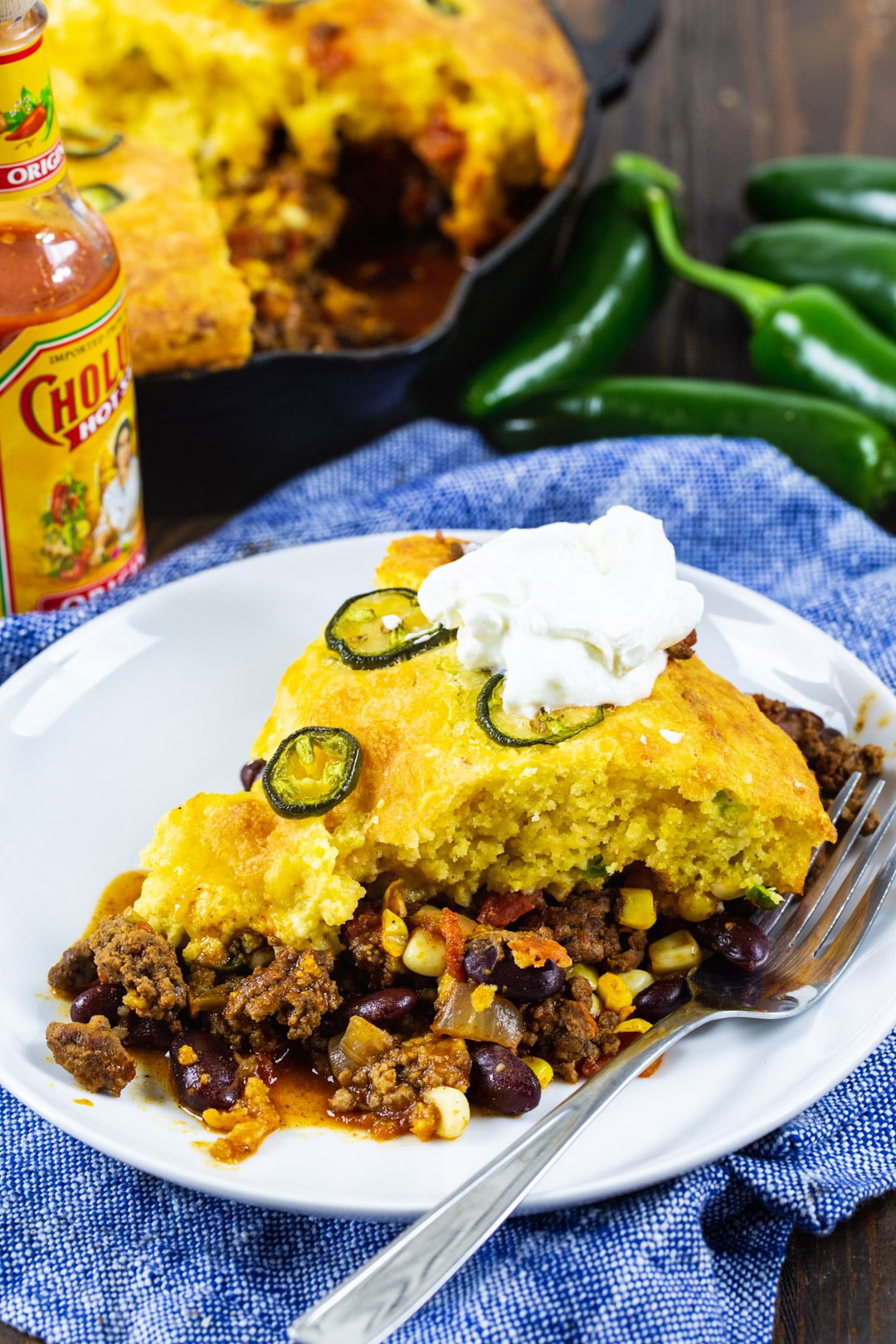 Slice of cornbread casserole on a plate.