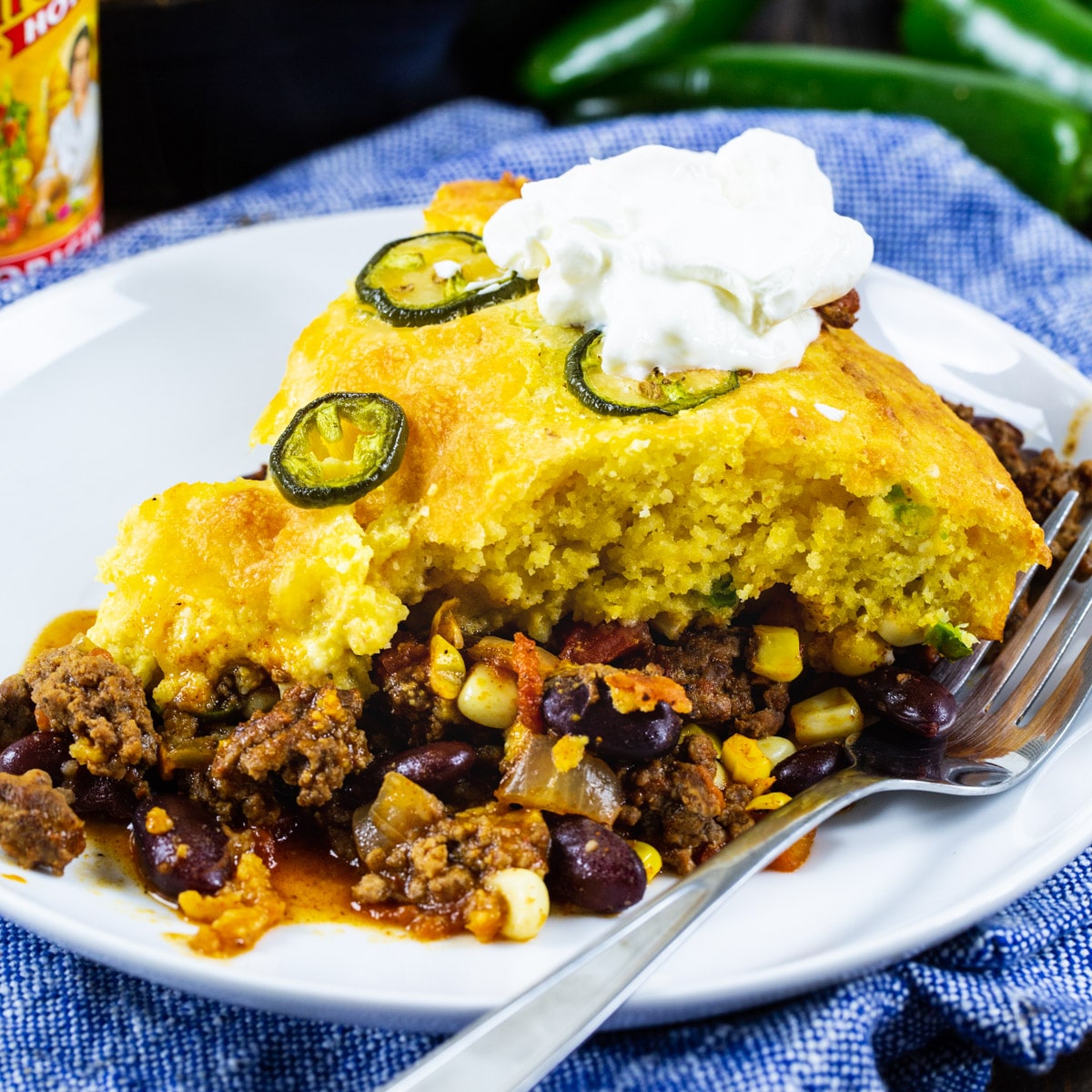 Slice of Jalapeno Chili Cornbread Casserole on a plate.