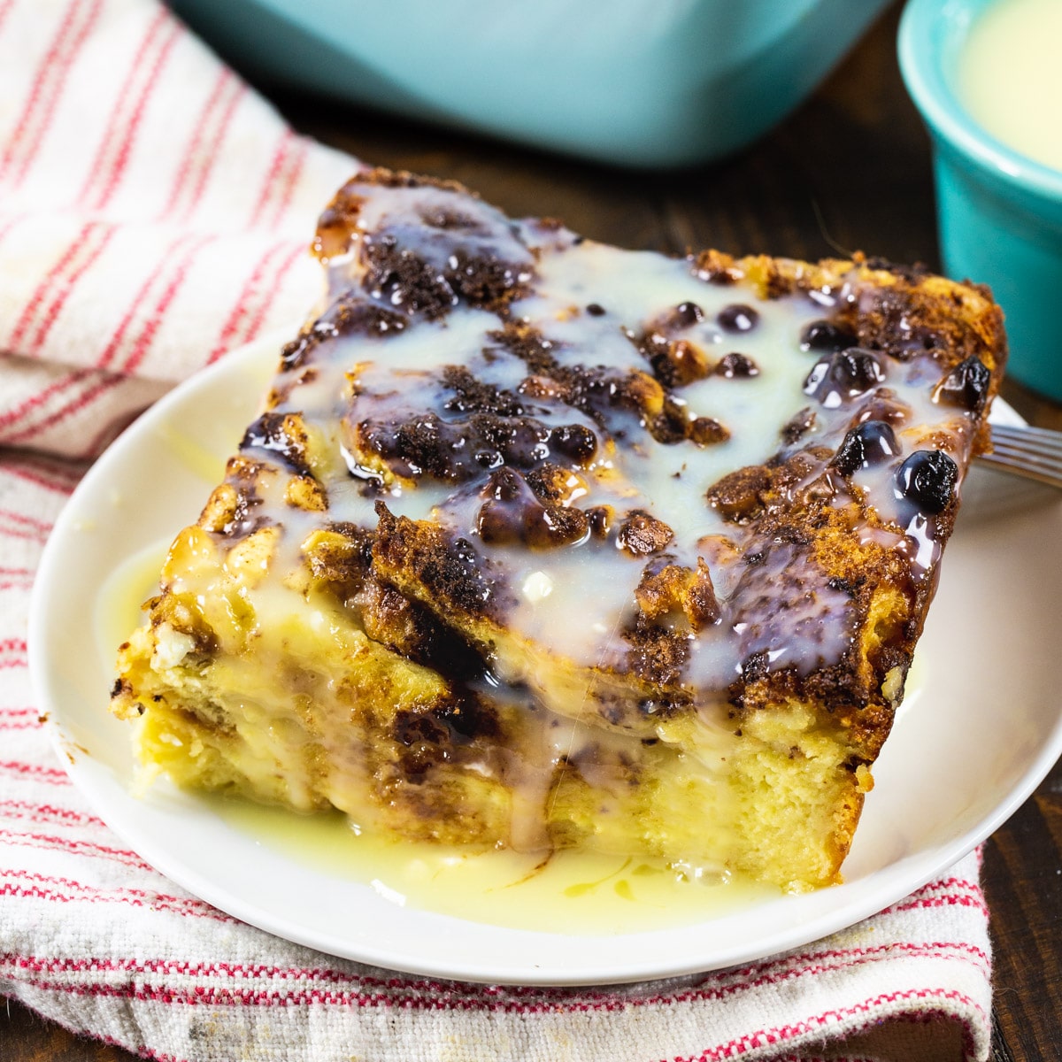 Slice of White Chocolate Bread Pudding on a plate.