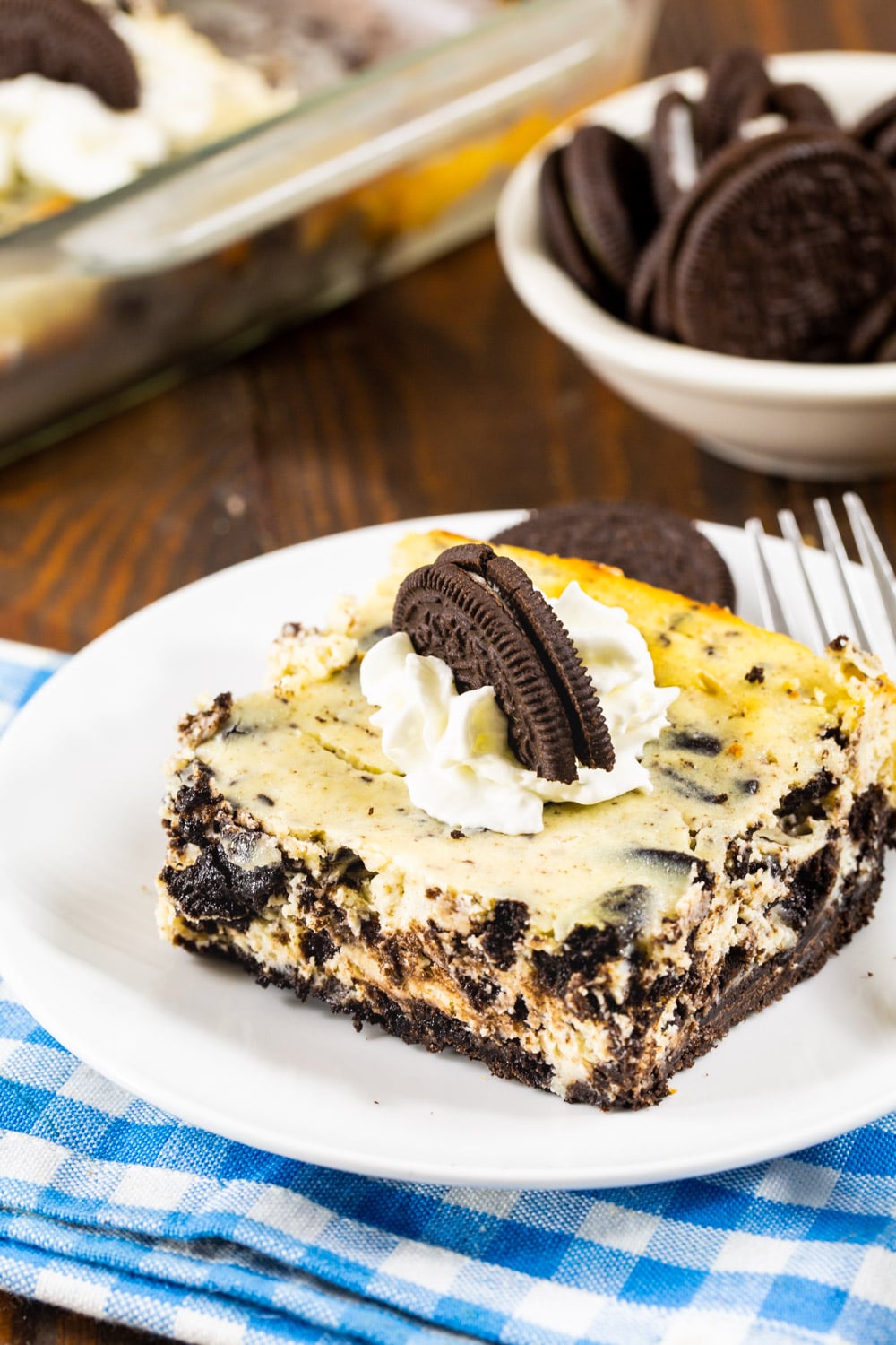 Oreo Cheesecake Bars dished up on a plate.