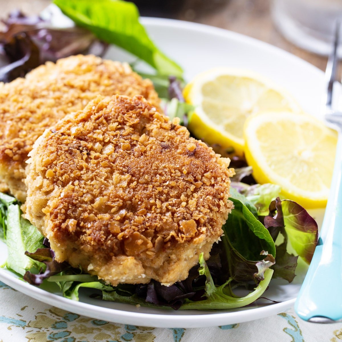 Southern Salmon Patties on a bed of lettuce.