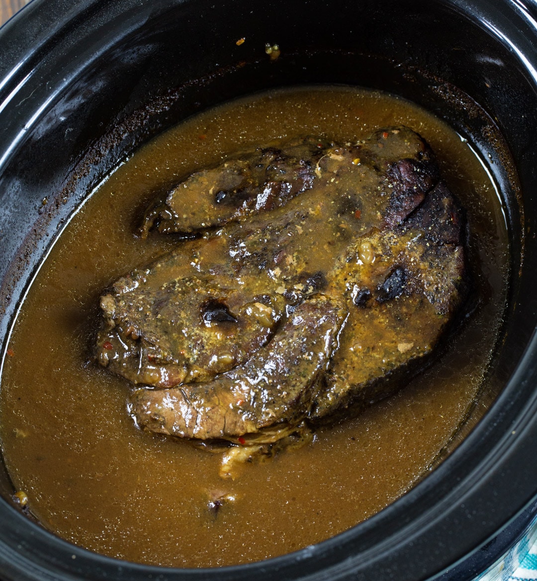 Cooked Pot Roast in a slow cooker.