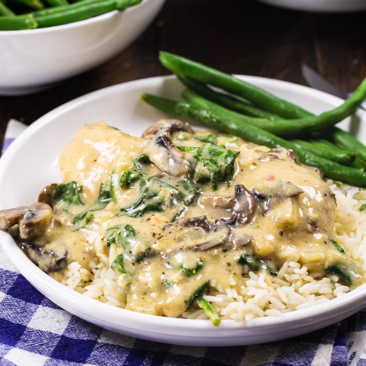 Garlic Parmesan Chicken over rice with green beans.