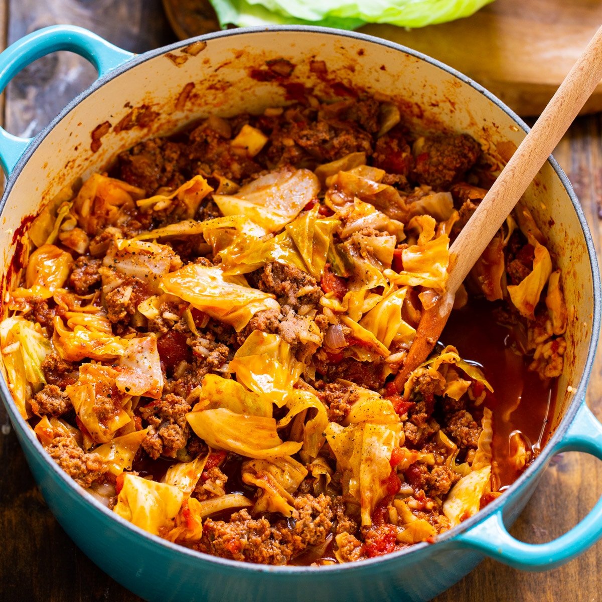 Unstuffed Cabbage Rolls in a blue Dutch oven.