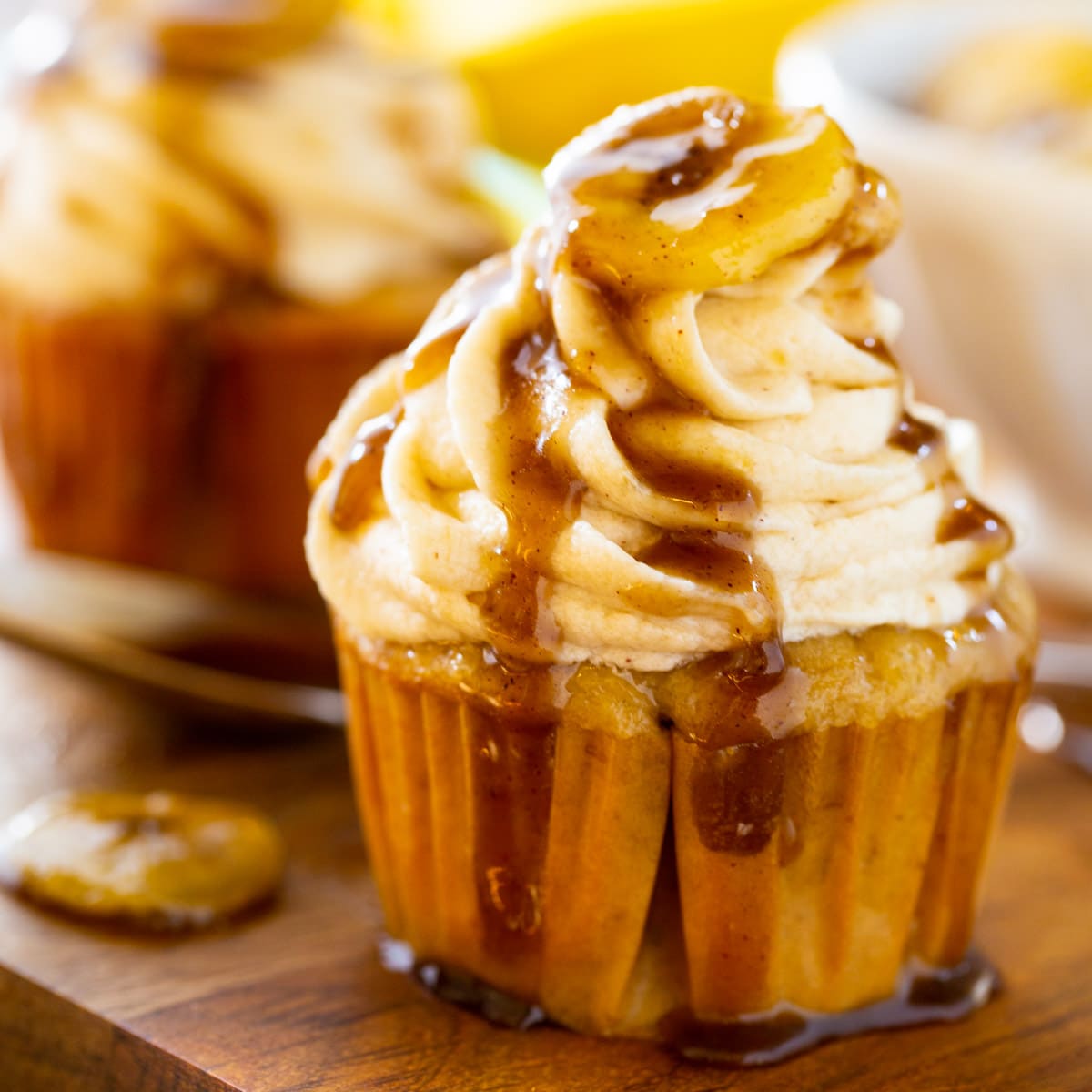 Bananas Foster Cupcake on a wooden board.