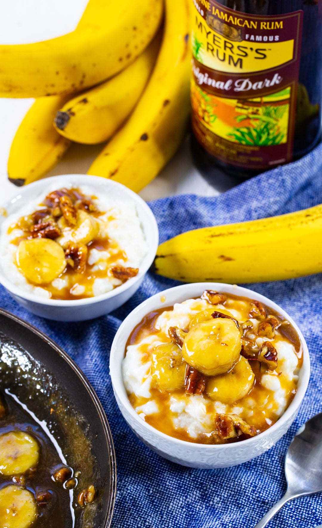 Two bowls of Bananas Foster Rice Pudding.