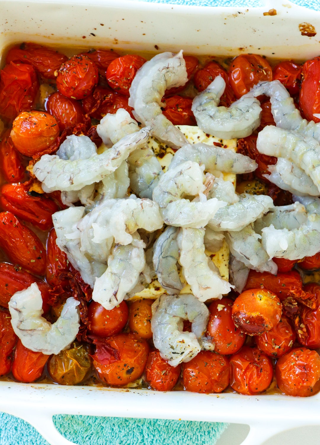 Shrimp added to baking dish.