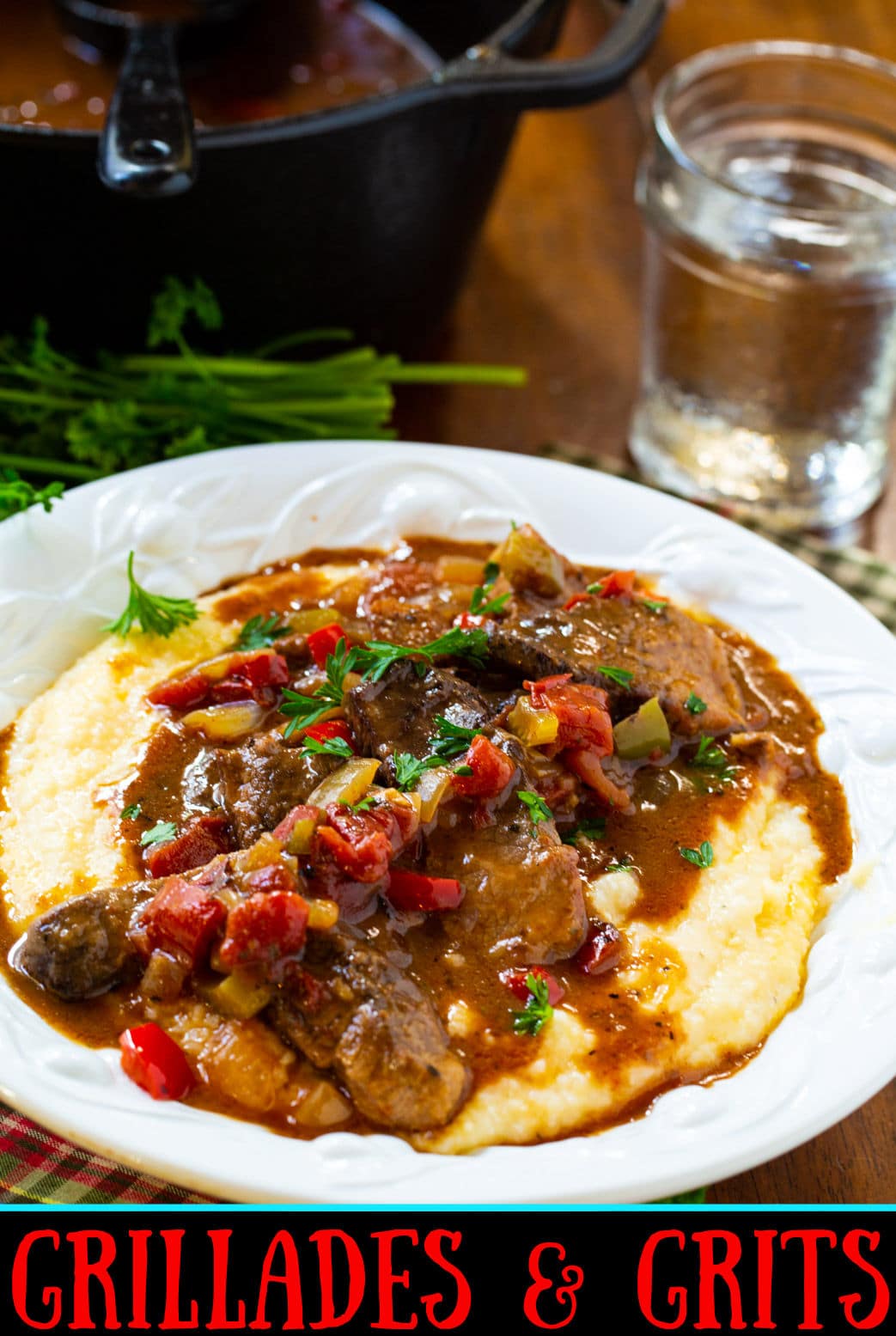 Grillades and Grits served in a pasta bowl.