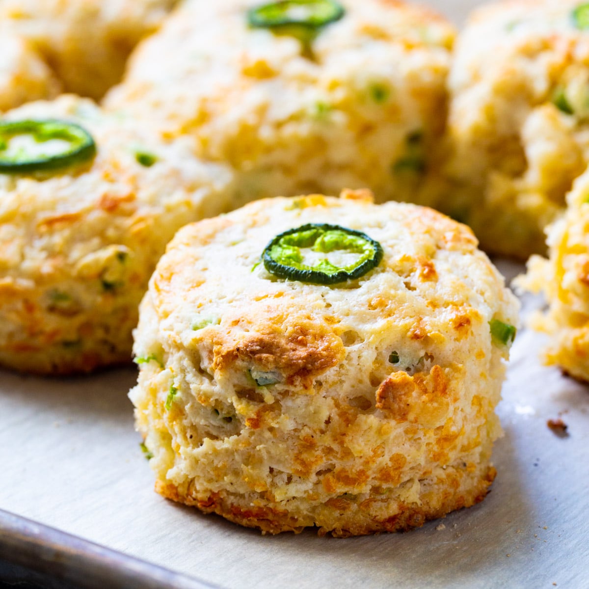 Jalapeno Cheddar Biscuits on a baking sheet.